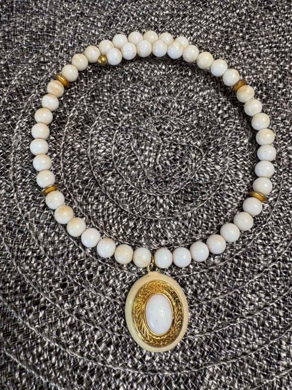 White Beaded Necklace with Gold Oval Pendant
